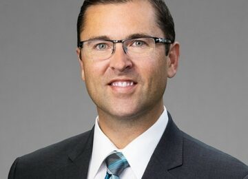 FINANCE/BANKING: AARON OLSON