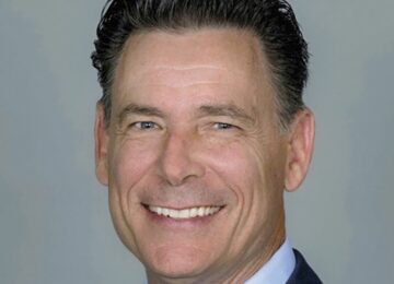 FINANCE/BANKING: MICHAEL JANETT