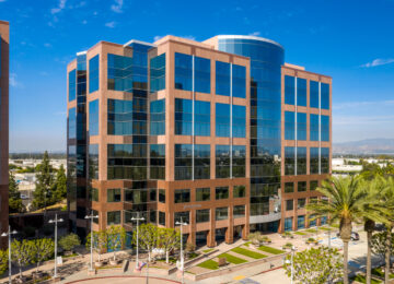 New American’s Arvielos Buy One MacArthur Tower