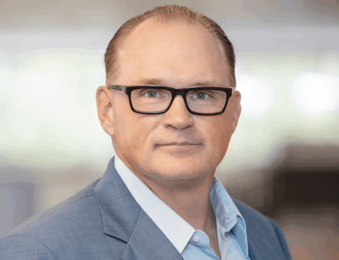 First American CEO Ken DeGiorgio exiting after being arrested for attacking a fellow passenger on a cruise